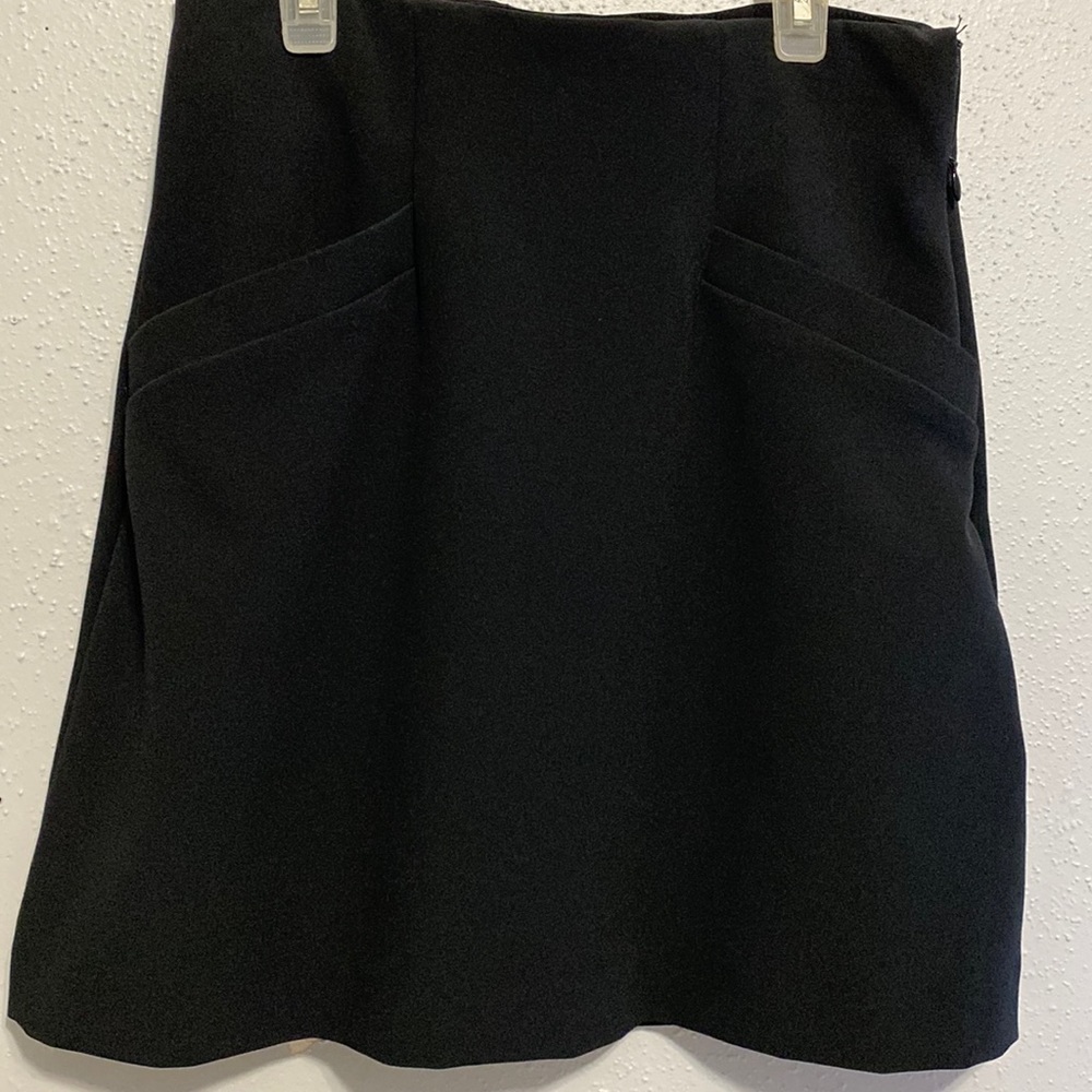 Black mini skirt with pockets